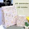 Bolsa de regalo alto valor de color ins bolsa de papel kraft estudiante exquisito regalo bolsa de embalaje de regalo caricatura linda bolso