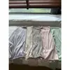 Camiseta de manga larga fina semitransparente rosa claro de Tencel para mujer, casual de verano, corte holgado con bordes enrollados, adecuada para usar sobre el aire acondicionado