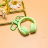 Nuevo llavero creativo de auriculares 3D, un accesorio moderno y genial para bolsos, joyería hecha a mano para manualidades y materiales para accesorios, al por mayor