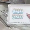 Armadura de mão Nai Zi mola e verão novo azul brilho estelar azul olho de gato de alta qualidade atacado adesivo para nail art