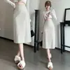 Saia Reta Feminina 2026 Outono Inverno Nova Saia Midi de Couro Meia Saia Justa na Cintura Alta Simples Emagrecedora Meia Saia