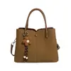 Yuezhi 2026 principios de otoño nuevo bolso cruzado tipo cubo de gran capacidad con estampado de lichi para mujer, bolso de hombro moderno
