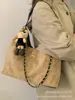 Bolso Pequeño Acolchado con Hilo Vintage para Mujer 2025 Nueva Moda Bolso Cruzado Versátil de Hombro a la Axila Súper Popular