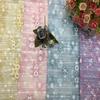 Tela de malla de hielo con estampado offset de bronce, directa de fábrica, nueva, con foto de flor de ciruelo, tela con borde bordado de encaje para niños