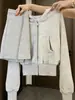 Traje deportivo casual de principios de otoño 2026, estilo nuevo para niñas, estilo moderno y relajado, sudadera con capucha y falda, conjunto de ropa estilo coreano