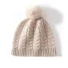 Venta al por mayor de fábrica Cachemira Transfronterizo Otoño e Invierno Nuevo Tejido de Punto Grueso con Trenzas y Pompón Protector contra el Frío Cálido Gorro de Punto