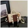 Nueva bolsa de viaje de moda de comercio exterior, gran capacidad, diseño moderno y minimalista, adecuada para viajes cortos, viajes de negocios y uso en el gimnasio, se puede llevar en la mano o usar como bolsa cruzada