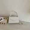 Simple Retro 2026 Moda Casual de Verano Nueva Francesa Tendencia de Diseño Bolso Pequeño Cuadrado de Hombro Cruzado para Mujer