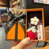 Caja de regalo de combustible para el examen de ingreso a la universidad para ganar el primer llavero de girasol bolsa colgante de bolsa para enviar a los estudiantes regalo de graduación