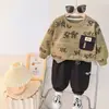 Conjunto de Roupas de Outono para Meninos 2026 Novas Roupas de Primavera e Outono Roupas Infantis para Bebês Moletom Casual para Bebê Conjunto de Duas Peças Tendência Atacado