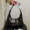 Bolso de mujer de alta gama transfronterizo, nuevo bolso tipo dumpling otoño 2026, bolso de hombro moderno y versátil, bolso de mano, bolso cruzado
