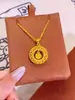 Tienda de Oro Mismo Estilo Collar de Corazón Picado Chapado en Oro Alta Retención de Color Floral Mariposa Moneda de los Cinco Emperadores Collar Venta al por Mayor