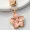 Nuevo Llavero de Dibujos Animados Lindo de Sakura Colgante de Boutique Creativo Colgante de Bolsa Llavero de Pareja Accesorios Metálicos