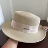 Cinta de Satén Elegante Etiqueta Pequeña Moda Sombrero de Cubo Francés Primavera Verano Lujo Ligero Versátil Viaje Protección Solar Sombrilla Sombrero de Paja