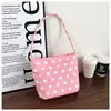 Bolso coreano de nicho de lunares de nailon para mujer, nuevo y versátil bolso de hombro y axila 2026, bolso de mano cruzado pequeño súper popular