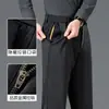 Calças retas masculinas slim fit de outono, business casual, resistentes a rugas, versáteis, com múltiplos bolsos e design oculto