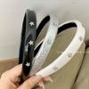 Diadema estrella de personalidad de Corea del Sur diseño nicho cuero versátil diadema de borde estrecho parte superior alta del cráneo temperamento dulce y genial accesorios para el cabello