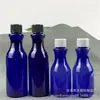 Lugar de fábrica botella de plástico azul de 60ml 100ml botella de envase cosmético de aceite esencial pet botella con tapa de rosca