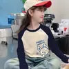 Estilo Coreano Mistura de Lã Raglan Manga Longa Casual Camada Base Top Outono Inverno Meninas Fashionável Doce Estiloso Desenho Animado Gola Redonda Camiseta