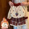 Conjunto de ropa de invierno para niña 2026 nuevo estilo Atuendo de Año Nuevo suéter grueso para bebé pantalones de cuadros coreanos ropa nueva festiva de Año Nuevo