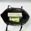 Bolso de hombro minimalista y versátil de estilo coreano transfronterizo, que irradia un ambiente sofisticado y retro, con un diseño de estampado de leopardo y ofreciendo una gran capacidad como bolso de mano.