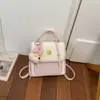 Mochila Fofa Nova Primavera 2026 Estilo Coreano Feminina Design de Nicho Alta Aparência Moda Versátil Bolsa de Ombro Único Transversal