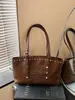 2026 Nova Bolsa Simples de Jeans Lavado de Grande Capacidade Bolsa de Ombro Vintage Desgastada com Rebites Bolsa de Ombro para o Trabalho