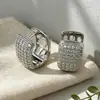 Pendientes de superventas transfronterizos europeos y americanos, cierres de oreja de circonita de cobre, totalmente incrustados de diamantes, adecuados para ir al trabajo, con un toque de lujo ligero y de alta gama, pendientes para mujer