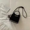 Bolso de Hombro Cruzado Estilo Coreano Nicho Bolso Cubo 2026 Otoño Nuevo Retro Alto Valor Bolso Cruzado para el Trabajo y el Viaje