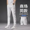 Dropshipping de Roupas Masculinas Xintang 2026 Estilo Coreano Slim Fit Stretch Versátil Verão Jeans Masculino Fino