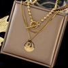 Europeu e americano cross-border retro multi-camadas empilhadas redonda marca feminina cabeça pingente otbuckle titânio aço metal luz luxo nicho colar
