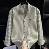 Camisa de manga larga a rayas, estilo coreano, sofisticada, para primavera/otoño, unisex, corte holgado, cárdigan de frente abierto, top de botones