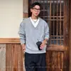 Tricô Coreano Falso Duas Peças com Decote V para Homens, Tricô Spliced de Alto Padrão Estilo Preguiçoso para Outono e Inverno, Tendência Exportação Atacado Transfronteiriço