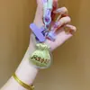 Regalos del Festival del Medio Otoño para Clientes: Pasteles de Luna, Bolsas de la Suerte, Dijes Dorados para Teléfono, Llaveros, Cadenas para Teléfono, Dijes para Bolsos