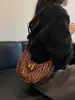 Bolso estampado de leopardo para mujer 2026 nuevo moderno moda versátil bolso de hombro gran capacidad bolso cruzado de alta gama bolso tipo dumpling