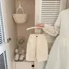 Pantalones de otoño para niños estilo coreano 2026 nuevo modelo ropa de otoño para bebés cintura elástica pantalones casuales versátiles pantalones largos de algodón puro para bebés
