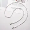 Cuerda para colgar en el cuello estilo Ins Lanyard largo para teléfono móvil Cadena anti-pérdida para teléfono móvil Trenzada Nuevo estilo Cadena de perlas para teléfono móvil cruzada