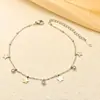 [acero de titanio de cuerpo completo] nueva moda serie de tobilleras de acero de titanio corazón de melocotón luna no se desvanece doble borla joyería para el pie