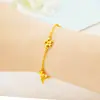 Pulseira de imitação de ouro 18K de luxo leve Joias para meninas Daisy Explosões transfronteiriças Pequenas joias de mão de ouro de areia fresca do Vietnã
