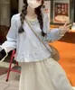 Camisa de manga larga con adorno de encaje dulce de principios de otoño para mujeres petite, blusa corta estilo babydoll con diseño único