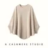 Blusa de caimento relaxado, solta, de comprimento médio, com mangas de três quartos, estilo morcego, feita de 35% cashmere e 65% lã, cor sólida