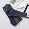 Otoño e invierno 2022 Nuevos jeans azul gris de cintura alta para mujer, pantalones ajustados ajustados con acolchado de terciopelo, pantalones de bota
