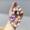 Nova corrente de celular com laço de contas de dopamina para meninas, pingente fofo para bolsa, chaveiro fofo, doce, legal para carro