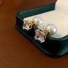 Pendientes de perlas chinas con diseño de flor de circón fresco y moderno, pendientes de temperamento con personalidad a la moda, pendientes ligeros de lujo de alta gama.