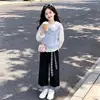 Conjunto de otoño estilo universitario para niñas: Chaleco dulce estilo coreano, camisa con cuello de muñeca y pantalones largos de retazos a cuadros retro - un conjunto de tres piezas