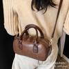 Bolsa de Bolos Portátil Retro al por Mayor para Mujer 2026 Nueva Moda Otoñal Bolsa Cuadrada Pequeña Bolso Cruzado Simple para Hombro