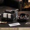 Conjunto de presente de xícara e pires de café de cerâmica de alta qualidade e requintado, perfeito como uma lembrança elegante ou um pequeno presente prático para o chá da tarde.