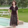 Traje de falda de verano de manga corta para mujeres de mediana edad y mayores 2026 nuevo conjunto de dos piezas de camiseta vestido de verano para mamá