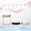 Tarro de crema de vidrio transparente engrosado en stock con tapa metálica, tarro para crema facial, tarro para crema de ojos, botella dispensadora de cosméticos de viaje