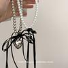 Collar con colgante de amor de metal dulce de verano con lazo y perlas para mujer, cadena de clavícula elegante y fresca.